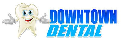 The image features a logo for DOWNTOWN DENTAL with stylized text and graphic elements, including a tooth character.